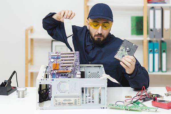 man repairing cpu