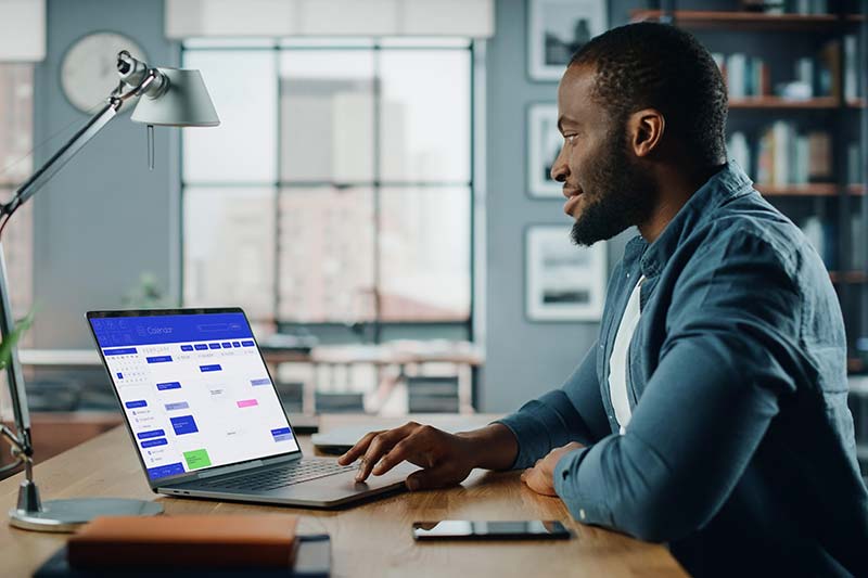 man using laptop